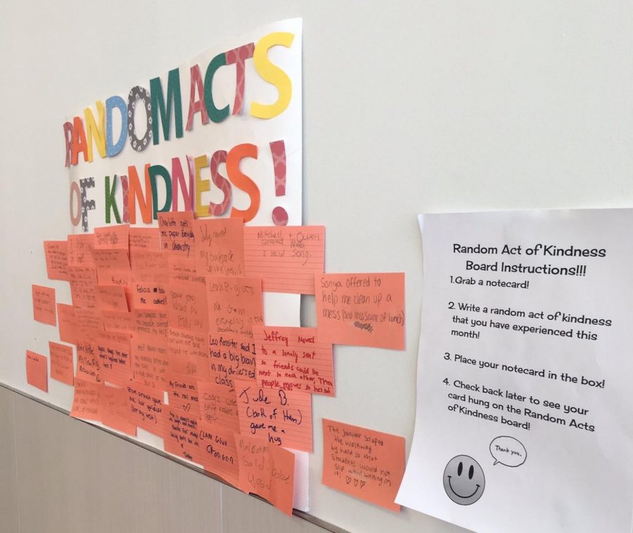 Peer Teams Random Acts of Kindness Board hangs in the cafeteria.